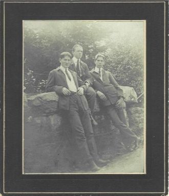 Young Men on Stone Wall