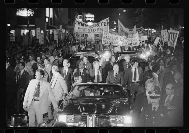 [Jimmy Carter and Mayor Richard J. Daley ride in a...