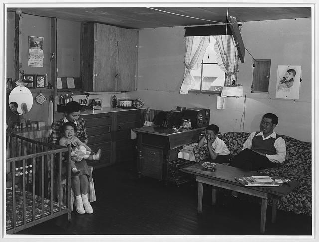 Mr. & Mrs. Richard Izuno and children, Manzanar...