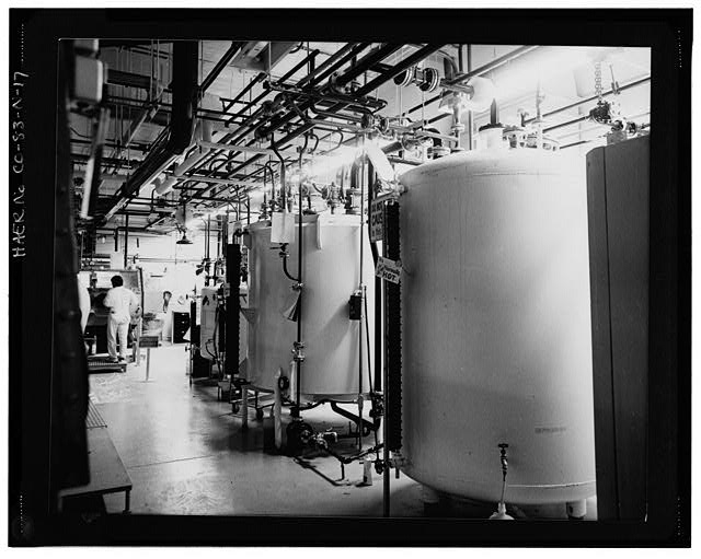 17. VIEW OF STEAM CONDENSATE COLLECTION TANKS. THE GLOVE...