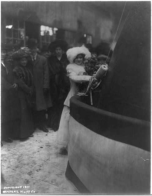 [Miss Mary L. Macon launching U.S.S. Arkansas]