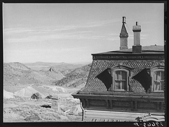 Corner of old mine office, abandoned mines in distance....