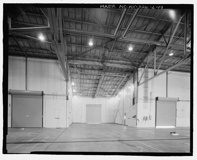 INTERIOR OF HANGAR AREA OF BUILDING. VIEW TO SOUTH -...