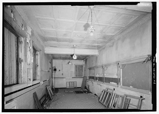 Interior view of first floor barber shop, looking...