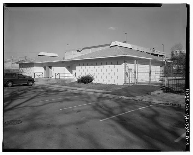 6. View west, exterior poolhouse Buckingham Apartment...