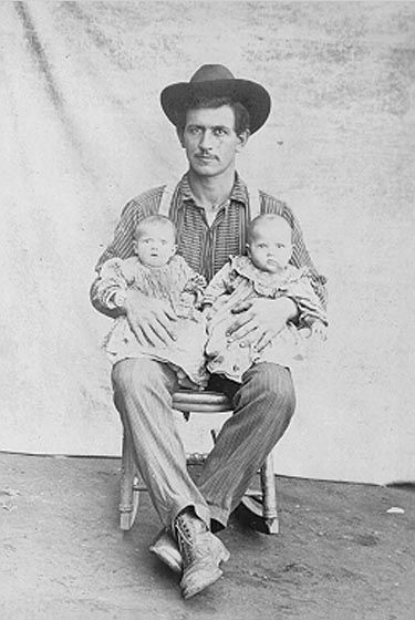 unknown man with twins