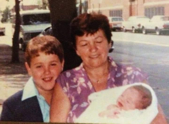 Keith, his grandma, and newborn brother 1979