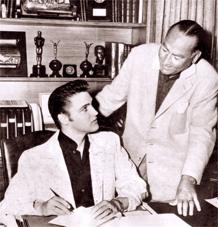Hal B. Wallis and elvis Presley.