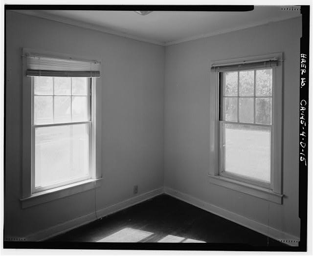 15. INTERIOR OF SOUTH BEDROOM SHOWING 6-LIGHT OVER...