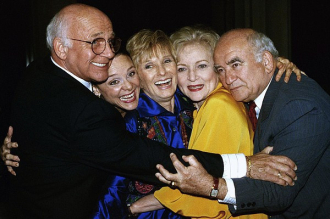 Gavin MacLeod (left) and the cast of The Mary Tyler Moore Show.