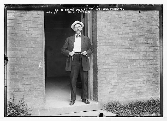 Ira G. Darrin, District Attorney,in doorway, to prosecute...