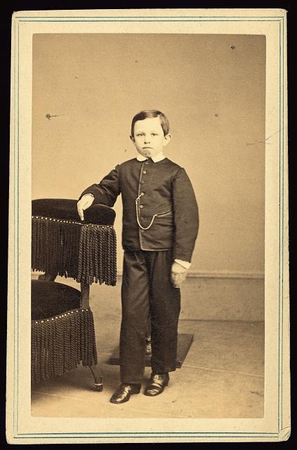 [Tad Lincoln, standing, leaning against a chair] / Brady.