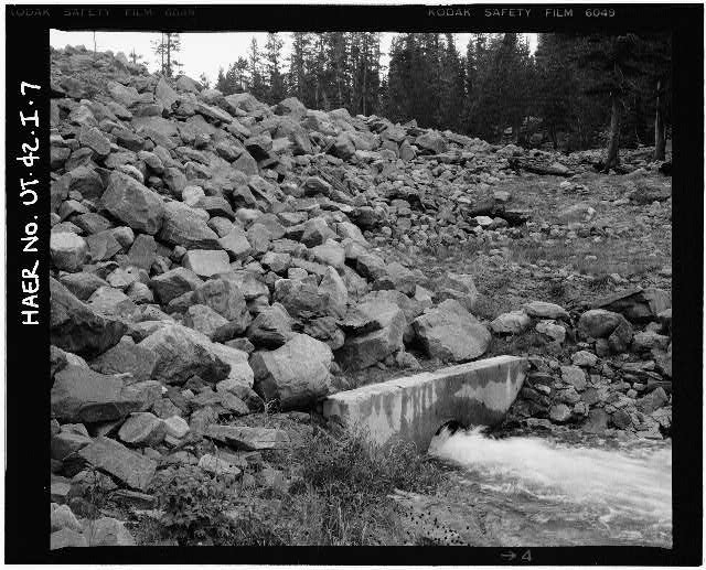 7. VIEW OF DOWNSTREAM FACE AND TOE OF DAM, WITH OUTLET...
