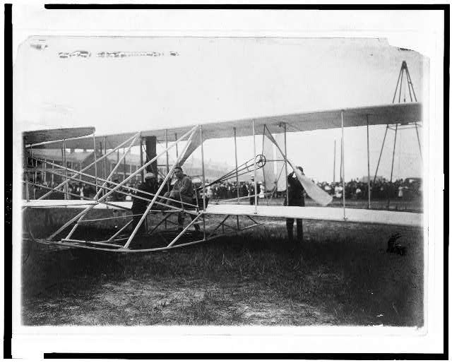 Lt. Selfridge & Mr. Wright stepping into the Wright...