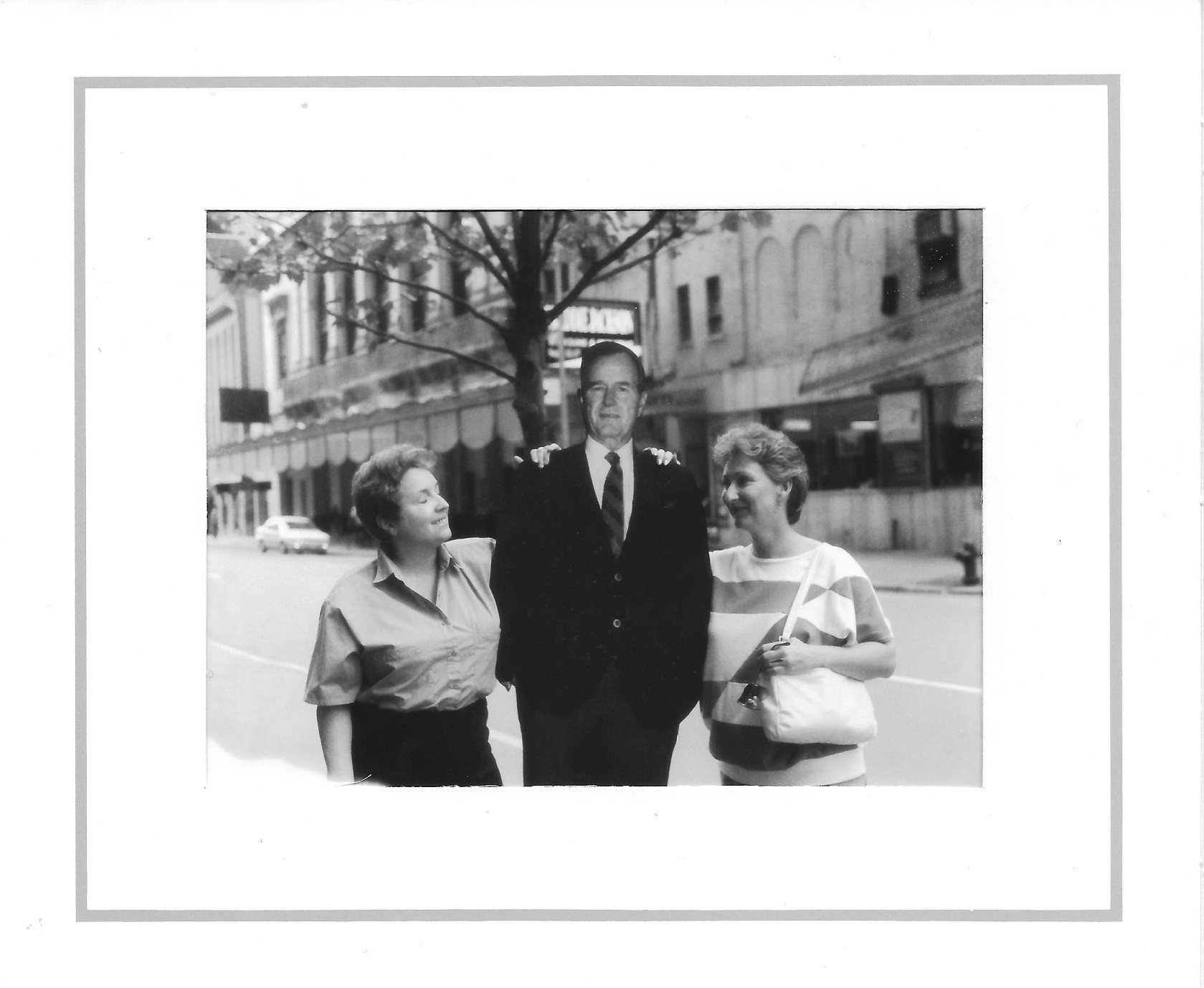 SaNDY AND JUDY WITH CARDBOARD GEORGE BUSH.