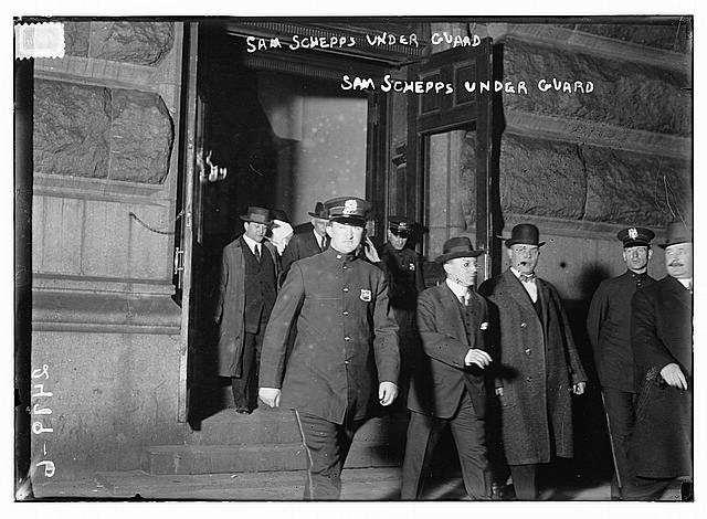 Sam Schepps under guard