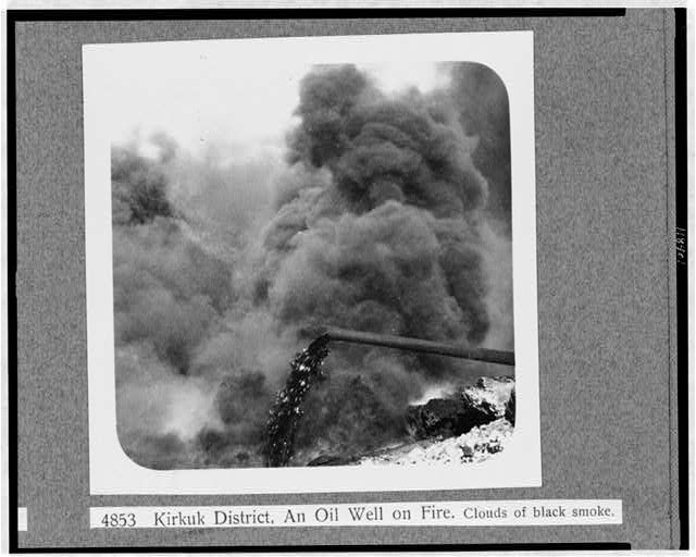 Kirkuk district--An oil well on fire--Clouds of black smoke