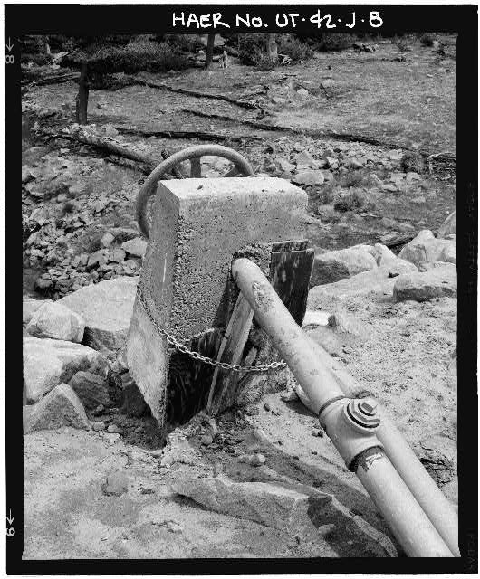 8. DETAIL VIEW OF INCLINED OUTLET GATE WHEEL, LOOKING...