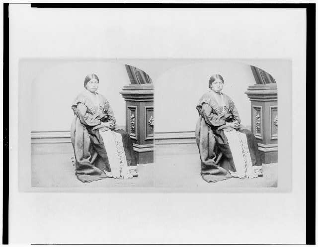 [Winnebago woman, full-length portrait, seated, facing...
