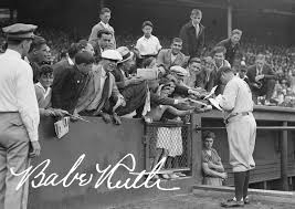 Babe Ruth autographing for fans