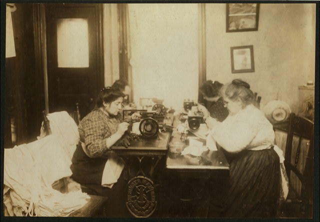 2 P.M. Workers on gloves, crowded into a small kitchen...
