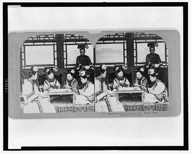 Manchurian ladies at tea and cards, Peking, China