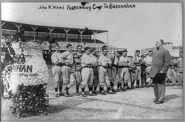 [John Montgomery Ward presenting cup to Roger Bresnahan...