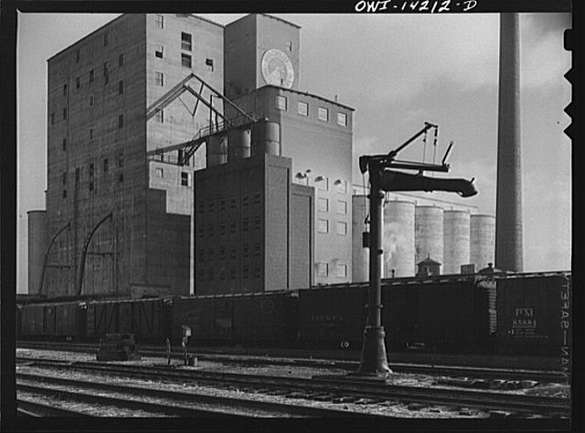 Grain elevator and mill at a railroad siding of the...