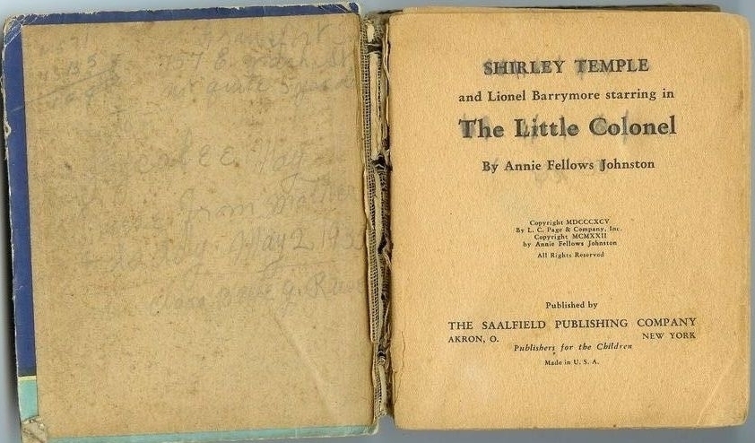 inside of little colnel book with note