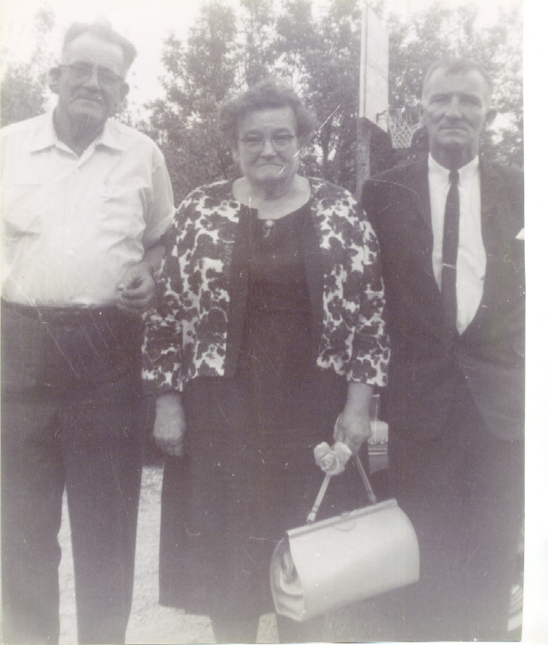 Clyde, Bertha, and Earnest Martin at their mother's funeral