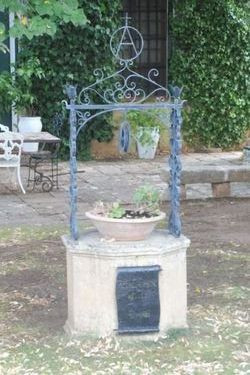 Orson Welles - ashes buried in the well.