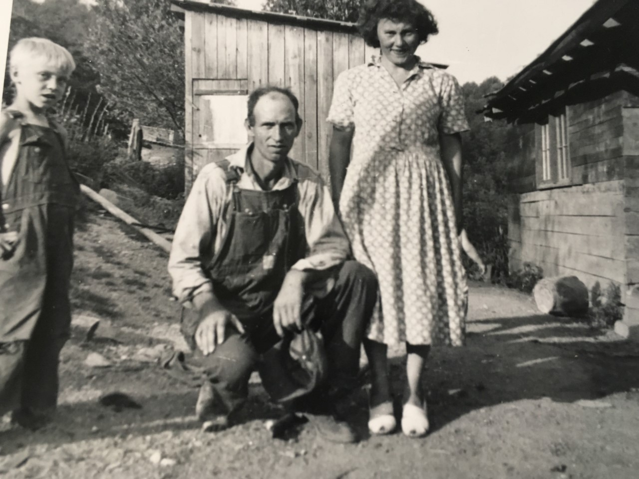 Barnett family:  Joe and Estell and Ernest looking on