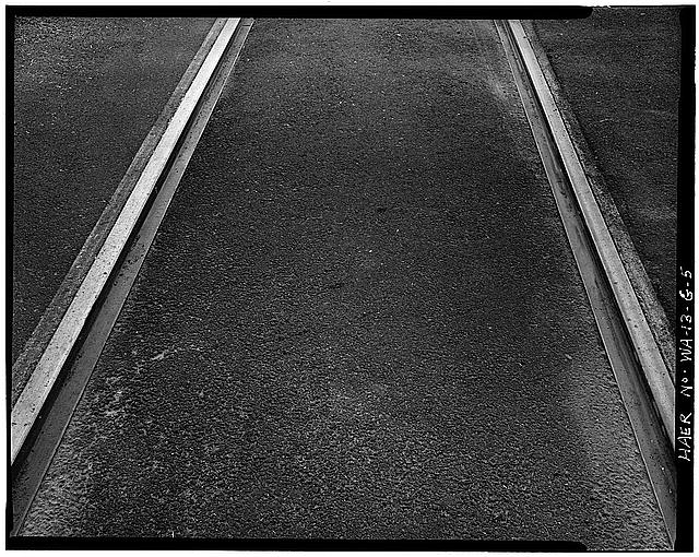 5. TYPICAL STREET TRACKAGE IN ASPHALT, SHOWING USE OF...