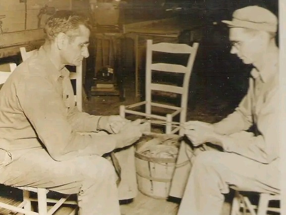 Roy McCoy, left and unknown