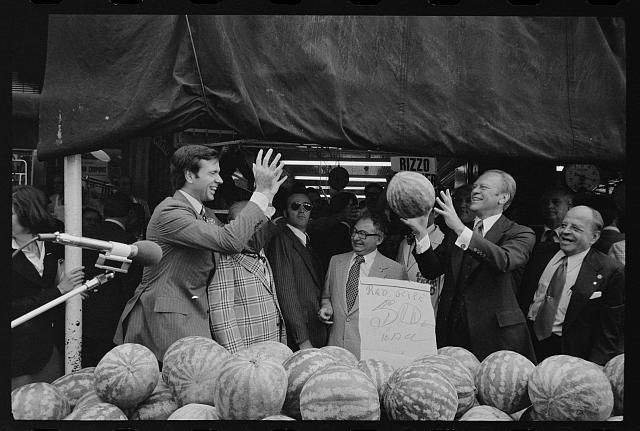 [President Gerald Ford tosses a watermelon in...
