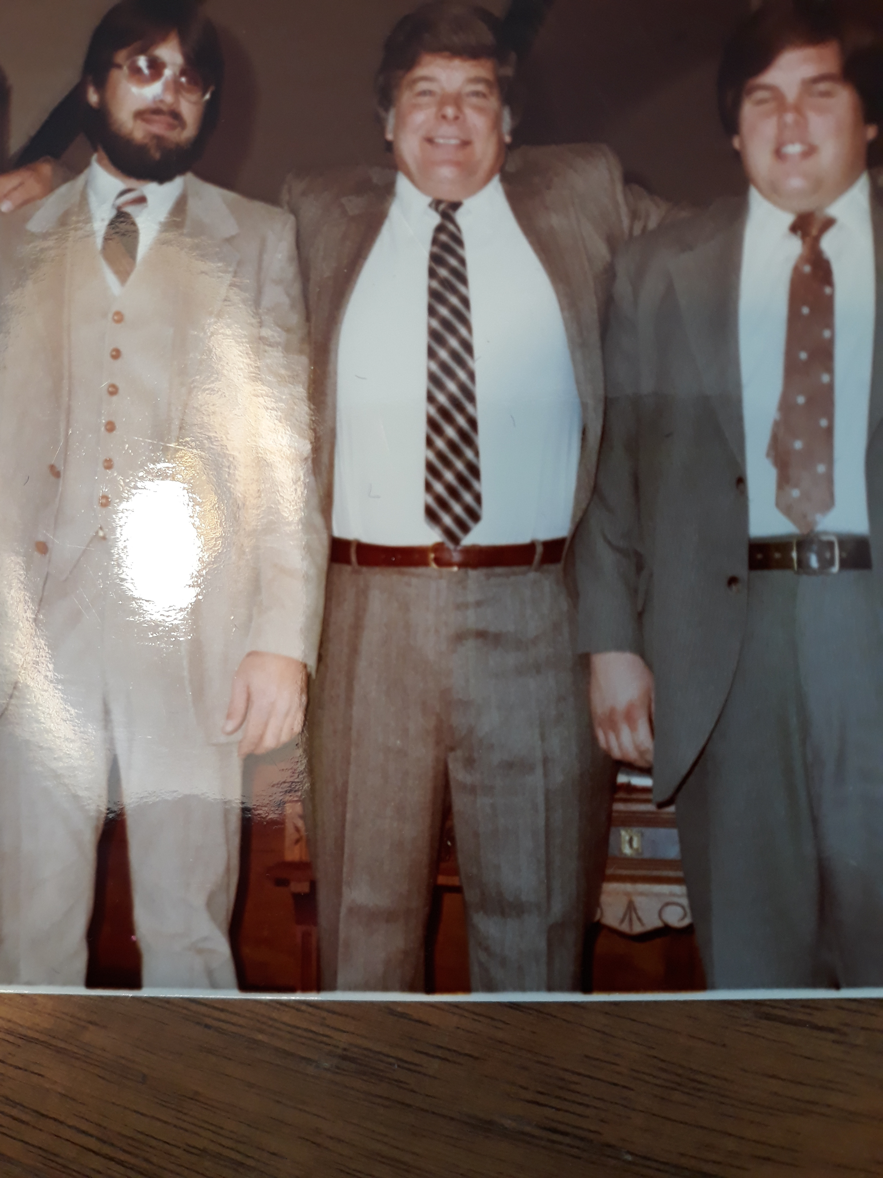 Son Paul, left, son David, right, with Dad.
