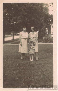 Marie (Coon) Greenwood, Annette (Coon) Pluckhan, Sisters, and Jamie, Annette's Son