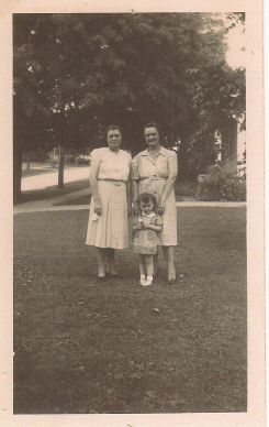 Marie (Coon) Greenwood, Annette (Coon) Pluckhan, Sisters, and Jamie, Annette's Son