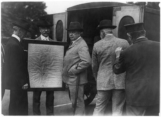 [Library of Congress officials with Declaration of...