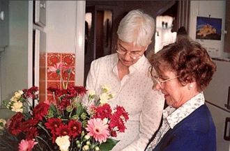Marg Halkett & Chris Heerbrant arranging flowers