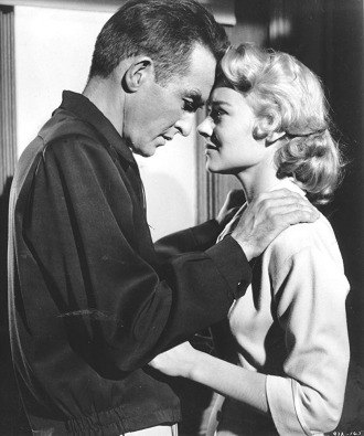 Montgomery Clift and Hope Lange in THE YOUNG LIONS.