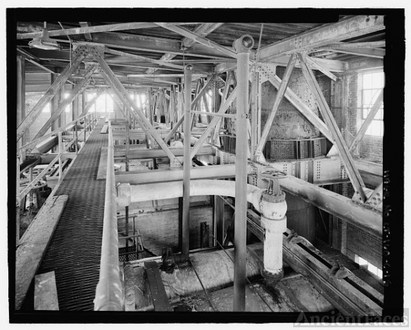 INTERIOR WITHIN TRUSSES FOR ROOF, SHOWING CATWALK, TOPS...