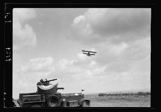 R.A.F. activities. Plane arriving in response to flare...