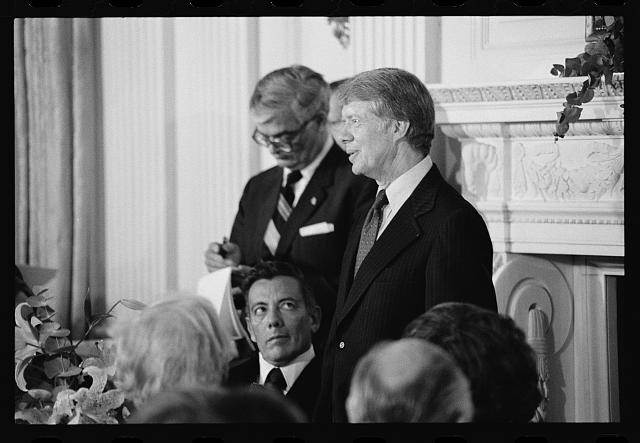 [President Jimmy Carter speaking at a White House dinner...