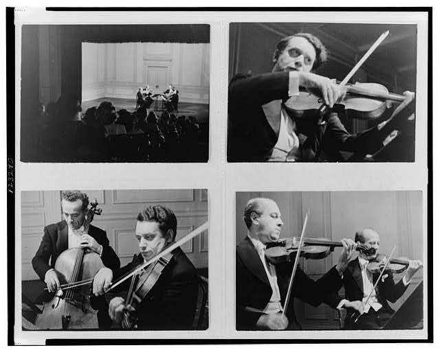 [Four images of the Budapest String Quartet performing in...