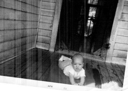 Baby on front porch.