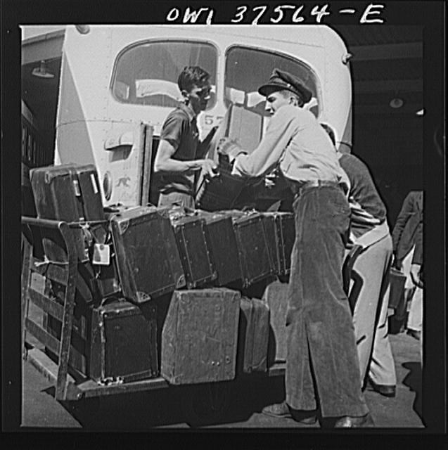 Cincinnati, Ohio. Loading baggage on a Greyhound bus at...