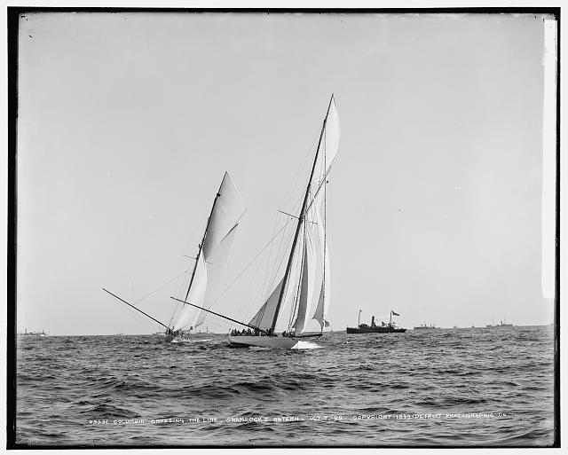 Columbia crossing the line, Shamrock I astern