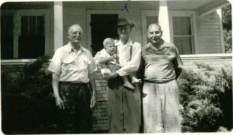 Amos McClurg, holding grandson Johnnie Case Broderick