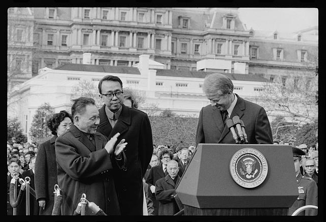 [Chinese Vice Premier Deng Xiaoping applauds as President...